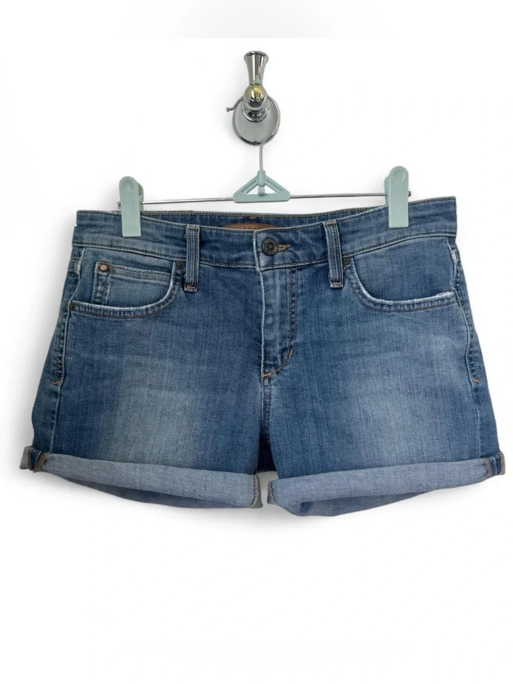 Joe’s Jeans Vintage Reserve 1971 denim shorts in a mid blue wash.
